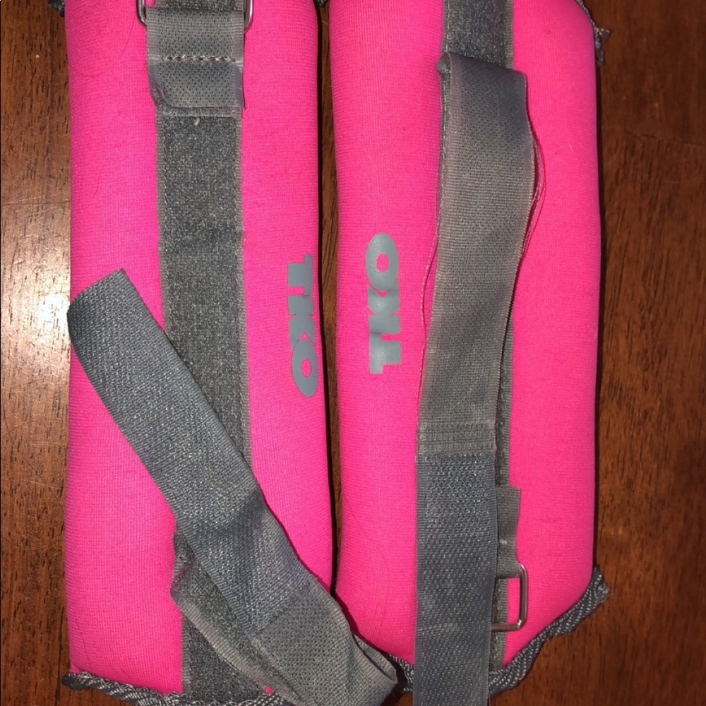 TKO hot pink 1 lb wrist weights.